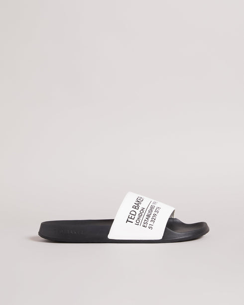 AZIELL-Sandals-Always be ready to hit the pool with AZIELL in your collection. In a classic slider style with Ted Baker branding across the top panel, these are a simple but stylish way to finish off your summer outfits. Sliders Ted Baker branded panel Open toe Slip on PU- Ted Baker Romania